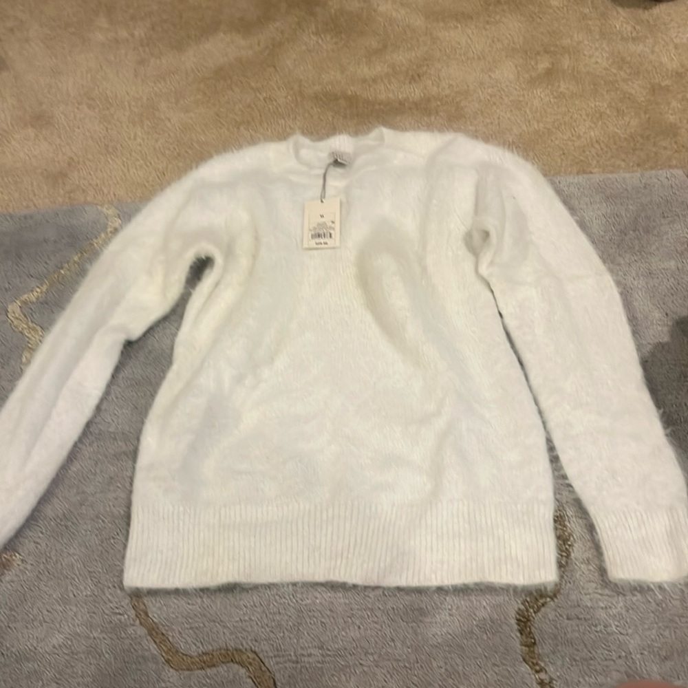 A new day sweater